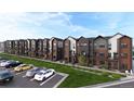 Modern townhomes with mixed brick and siding exterior, individual balconies, and attractive landscaping at 4 Ascent Trl, Englewood, CO 80112