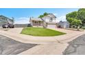 Attractive home exterior with a spacious front yard and a two car garage at 12366 Elm Way, Thornton, CO 80241