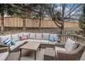 Inviting backyard deck with comfortable seating, perfect for outdoor entertaining at 4501 Whitehall Ln, Highlands Ranch, CO 80126