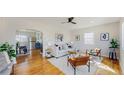 Bright and airy living room featuring hardwood floors and modern furnishings at 4154 Depew St, Denver, CO 80212