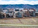 Well-maintained homes feature backyard patios with mountain views in a vibrant neighborhood at 8346 Mount Kataka St, Littleton, CO 80125