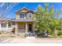 Charming home with welcoming front porch and landscaped yard at 3793 Cadence Dr, Castle Rock, CO 80109