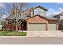 Beautiful two-story home with mature landscaping, a welcoming front porch, and two-car garage at 4094 Bimini Ct, Boulder, CO 80301
