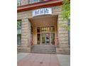 Close up of the West End Lofts entrance, featuring tiled steps and a decorative entrance way at 1435 Wazee St # 408, Denver, CO 80202