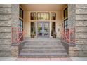 Close up of the West End Lofts entrance, featuring tiled steps, handrails and doorway at 1435 Wazee St # 408, Denver, CO 80202
