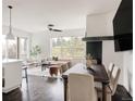 Bright living room with modern furnishings, open floor plan, and large windows that let in natural light at 1438 Little Raven St # 104, Denver, CO 80202