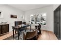 Bright home office with large windows and a classic desk at 520 Columbine St, Denver, CO 80206