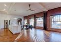 Bright, open-concept space with kitchen island, exposed brick, and city views at 1555 California St # 605, Denver, CO 80202