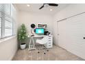 Bright office space featuring a white desk setup, modern decor, and natural light at 6791 Navajo Ct, Denver, CO 80221