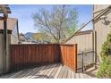 Inviting outdoor deck with wood paneling and access to common area, offering relaxation and community connection at 4202 Greenbriar Blvd # 46, Boulder, CO 80305