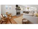 Bright and airy living room with a fireplace and comfortable seating at 595 S Race St, Denver, CO 80209