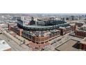 Aerial view of Coors Field, home of the Colorado Rockies, surrounded by the downtown Denver skyline at 1940 Blake St # 300, Denver, CO 80202