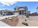Charming two-story home with stone accents, manicured landscaping, and welcoming front porch at 9 N Waterloo St, Aurora, CO 80018