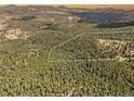 Secluded property with large lot and mountain views at 26269 Richmond Hill Rd, Conifer, CO 80433