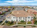 Townhome community aerial view showcasing building exteriors and landscape at 1536 Sepia Ave, Longmont, CO 80501