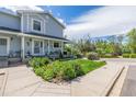 Inviting exterior showcases meticulous landscaping, enhancing the home's curb appeal and charm at 6260 Everett Ct # D, Arvada, CO 80004