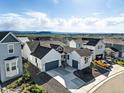 High-angle shot showcasing house with mountain views in a neighborhood at 4855 Saddle Iron Rd, Castle Rock, CO 80104
