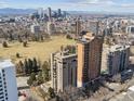 Scenic aerial view showcasing the city skyline and buildings nestled amidst a lush green landscape at 1111 Race St # 3A, Denver, CO 80206