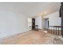 Inviting living room with a view of the front entry at 11029 W 65Th Way, Arvada, CO 80004