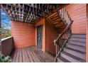 Close up of building entrance with stairs, porch and door at 3050 W 32Nd Ave # 104C, Denver, CO 80211