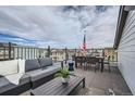 Relaxing rooftop patio featuring stylish seating and great views at 1751 Peak Loop, Broomfield, CO 80023