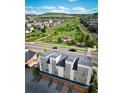 Modern townhome with solar panels, adjacent to a green space with mountain views at 10154 Belvedere Loop, Lone Tree, CO 80124