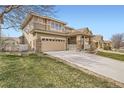 Exterior view of a two-story home with a well-maintained front yard at 3523 Brushwood Dr, Castle Rock, CO 80109