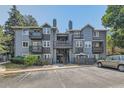 Well-maintained condo complex featuring manicured landscaping, ample parking, and a welcoming entrance at 7893 Allison Way # 101, Arvada, CO 80005