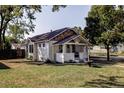 Renovated craftsman home with a spacious lawn and mature trees at 4659 Wyandot St, Denver, CO 80211