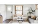 Living room with hardwood floors and ample natural light at 4659 Wyandot St, Denver, CO 80211