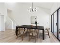 Bright dining room with dark wood table and six chairs, plus a view at 6539 Pinewood Dr # 57, Parker, CO 80134