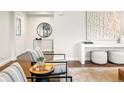 Tastefully decorated living room with modern furniture and elegant decor at 1401 S Clarkson St, Denver, CO 80210