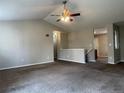 Cozy living room with neutral walls and plush carpeting at 18784 E Linvale Pl, Aurora, CO 80013