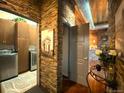 Convenient laundry room with modern washer and dryer units at 10111 Inverness Main St # 223, Englewood, CO 80112