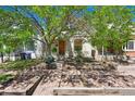 Inviting home front with well-tended landscaping and a quaint, welcoming facade at 1529 E 22Nd Ave, Denver, CO 80205