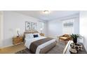 Inviting main bedroom with stylish decor and plenty of natural light at 7932 E 49Th Pl, Denver, CO 80238