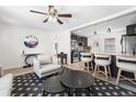 Open-concept living area with adjacent modern kitchen and bright, airy atmosphere at 3251 N Adams St, Denver, CO 80205