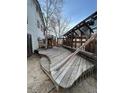 Large backyard deck featuring multiple levels and a canopy at 2758 S Salida St, Aurora, CO 80013