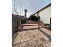 Terraced backyard featuring custom stone tiles with space to build out the yard at 2758 S Salida St, Aurora, CO 80013