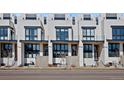 Modern townhome exterior featuring clean lines, stylish windows, and contemporary architectural design at 4263 E 8Th Ave, Denver, CO 80220