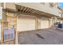 Attached garages with additional storage space at 1818 S Quebec Way # 11-8, Denver, CO 80231