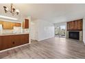 Open floor plan featuring living room, balcony, and kitchen at 14700 E Kentucky Dr # 524, Aurora, CO 80012