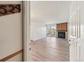 View of the living room with a fireplace and sliding glass doors to a balcony at 14700 E Kentucky Dr # 524, Aurora, CO 80012