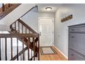 Entryway with hardwood floors, stairs and coat rack at 1370 S Idalia St # C, Aurora, CO 80017