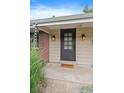 Inviting front entrance with a decorative door and landscaping at 3131 S Leyden St, Denver, CO 80222