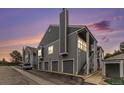 Beautiful townhome at sunset features private garage and easy access stairs at 7453 Singing Hills Dr, Boulder, CO 80301