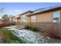 Large backyard with patio, providing ample outdoor space at 486 S Youngfield Cir, Lakewood, CO 80228