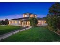Stunning two-story home with beautifully landscaped grounds at 3250 Via Margarita, Castle Rock, CO 80109