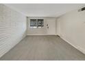 Empty living room with neutral walls and carpeted floors at 1723 Robb St # 31, Lakewood, CO 80215