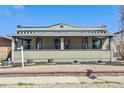 Charming home with covered front porch, updated paint and xeriscaping at 3946 Perry St, Denver, CO 80212